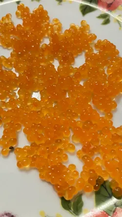 Червона ікра з форелі зі свого ставка. Ірпінь